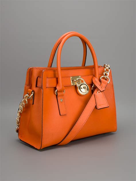 orange michael kors purse small|Michael Kors orange bag.